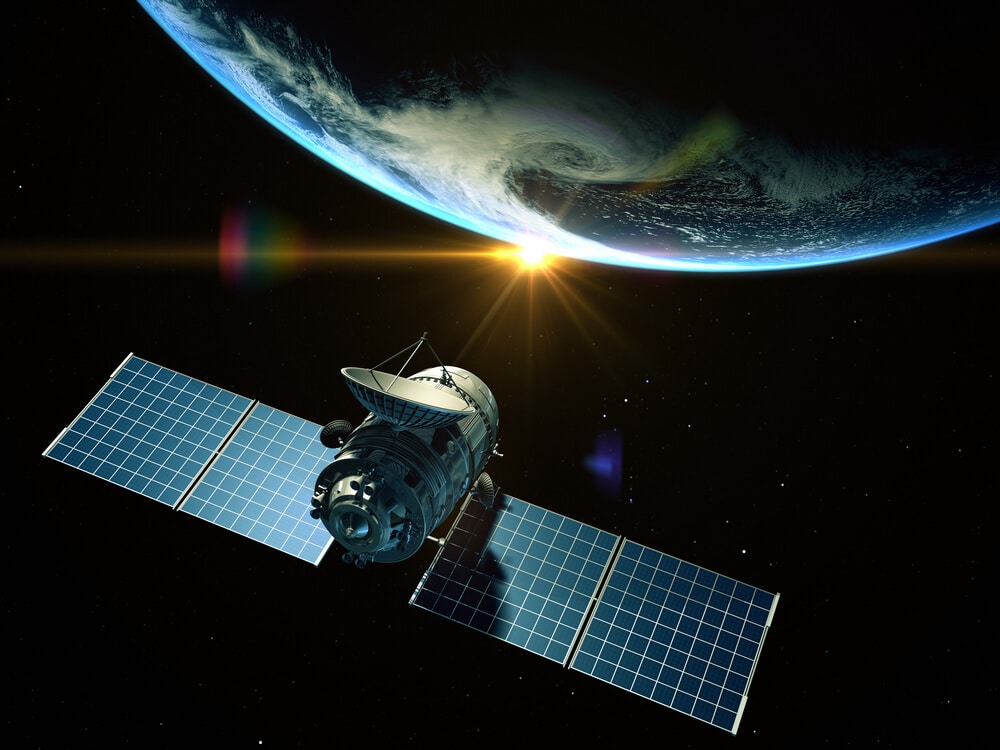 Satellite orbiting earth connected to a GSaaS - Ground Station as a Service